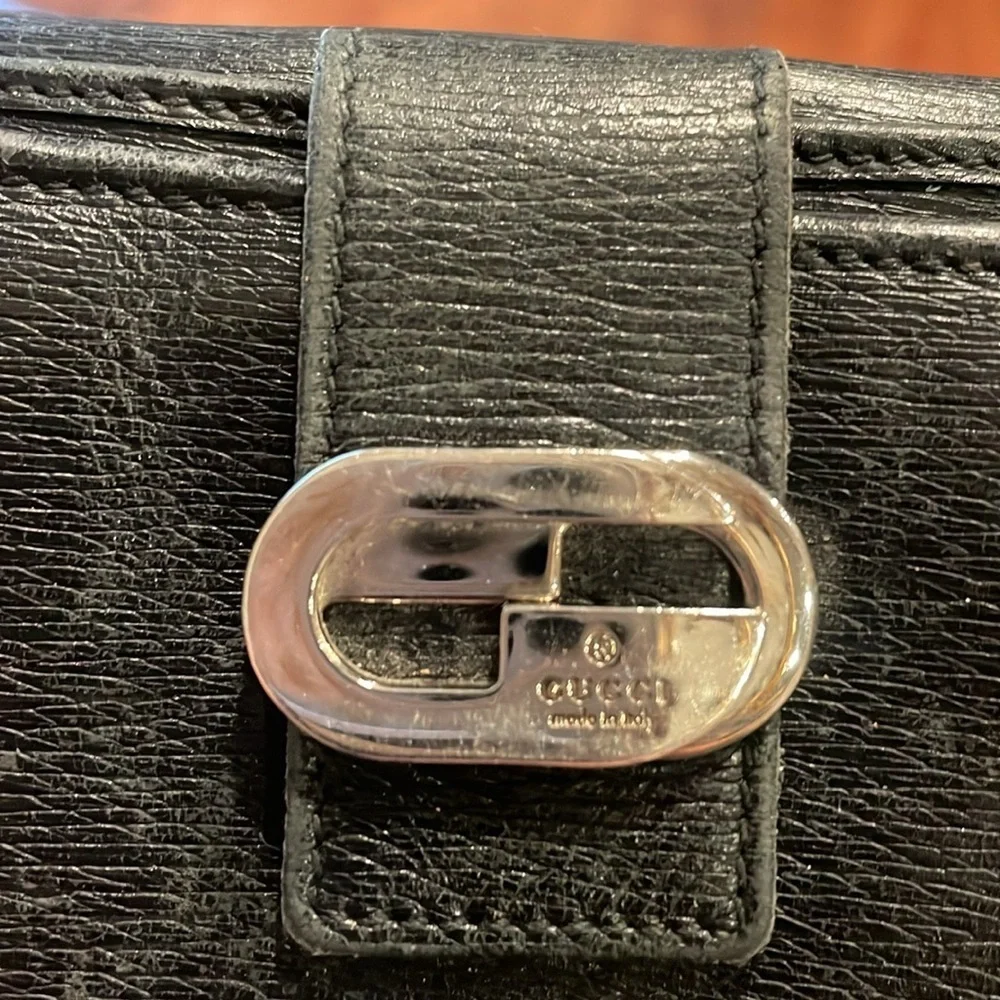 Gucci black leather (unisex) wallet. Snap in front for cards/cash back coin WLT